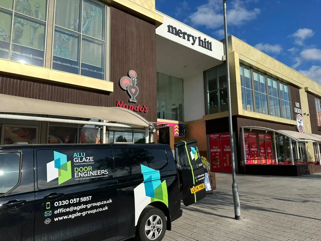 Alu-Glaze service van outside a commercial shopping centre