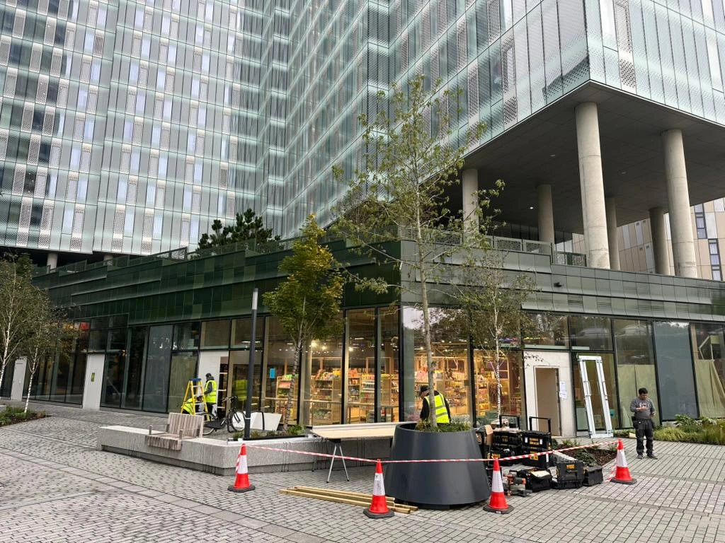 Curtain wall adaptions at Acer Tower Manchester showing infilled door openings with toggle-glazed insulated glass units