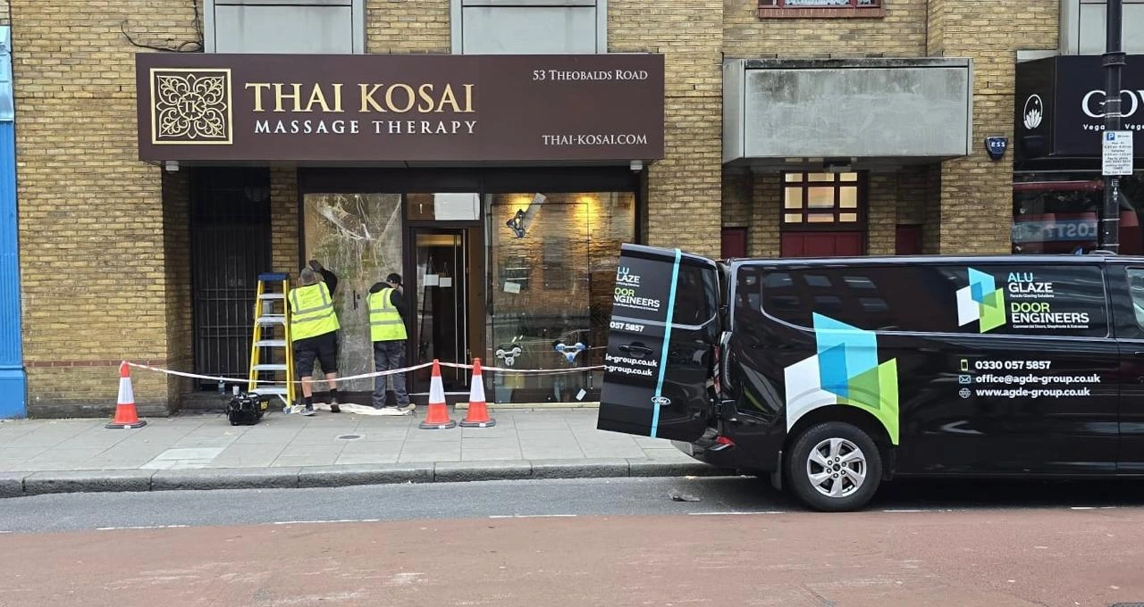 Replacement shopfront insulated glass unit installed in aluminium framing system, Theobalds Road Central London